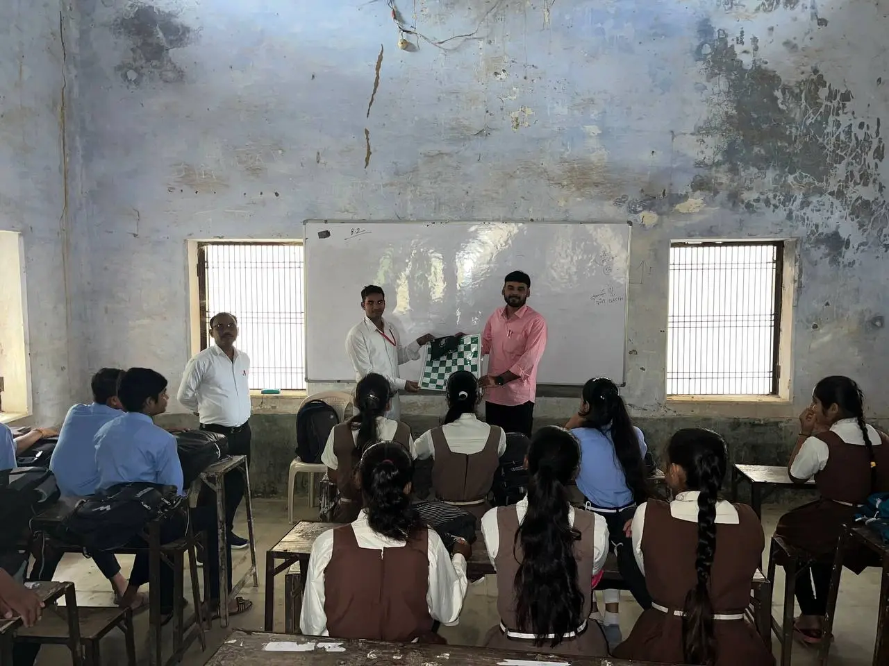 Team visiting rural government school